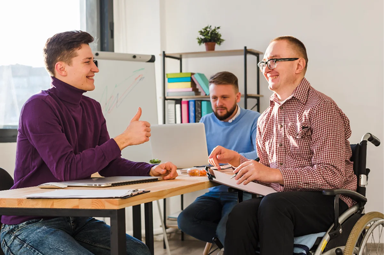 Support coordinator meeting with participants around a table
