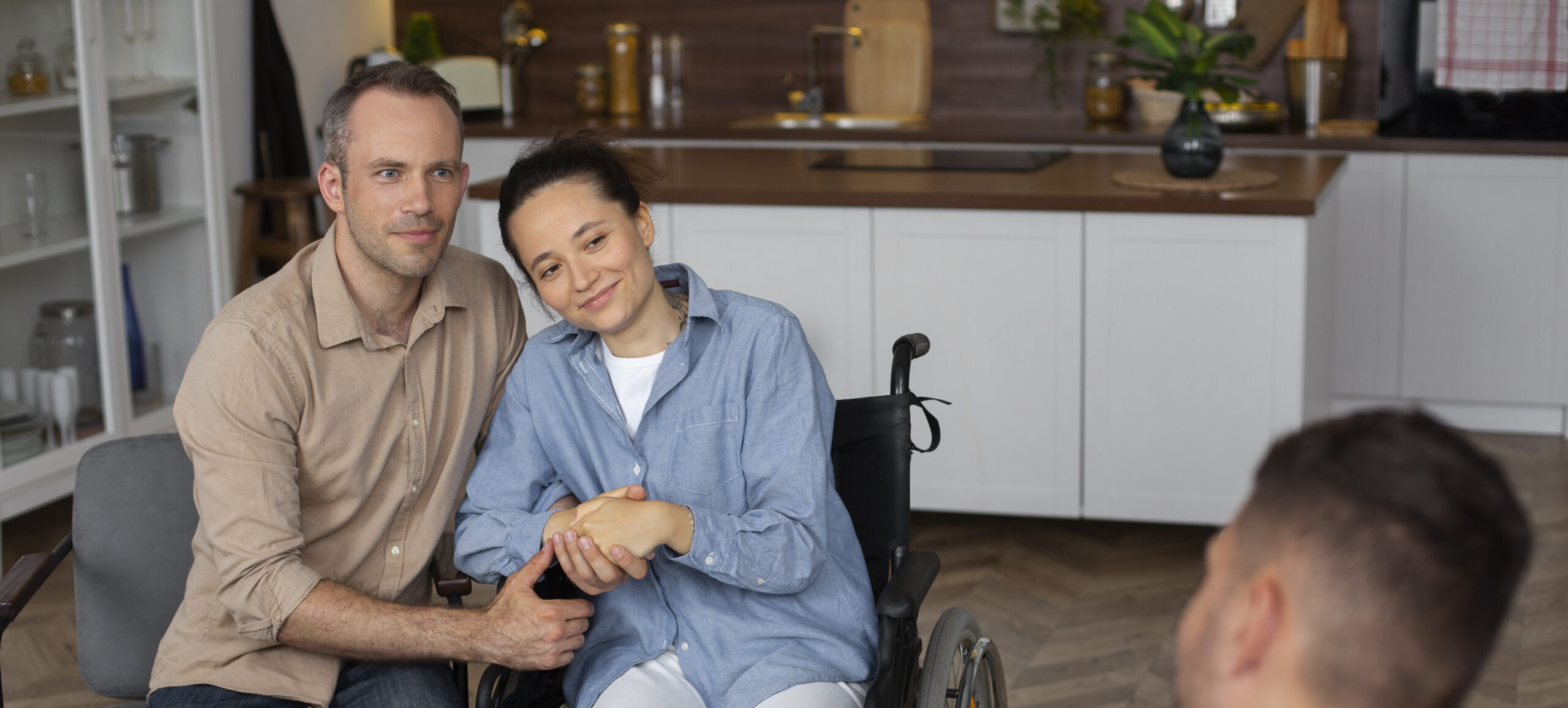 Support workers assisting a participant with complex care needs